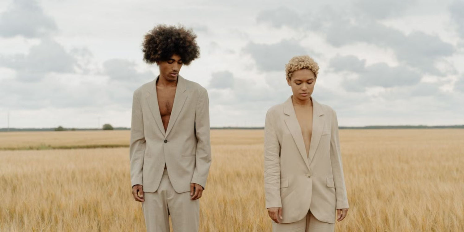 Gender-neutral fashion styling with diverse clothing pieces representing fashion without gender boundaries