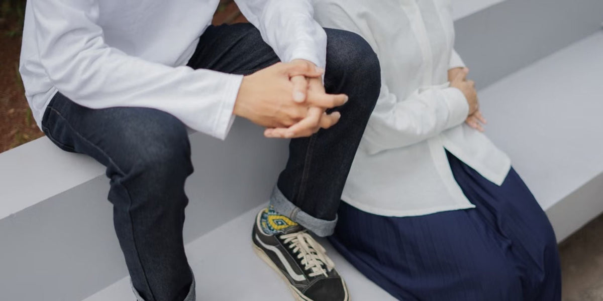 Close-up of model, showing relaxed unisex fit made from GOTS-certified organic cotton