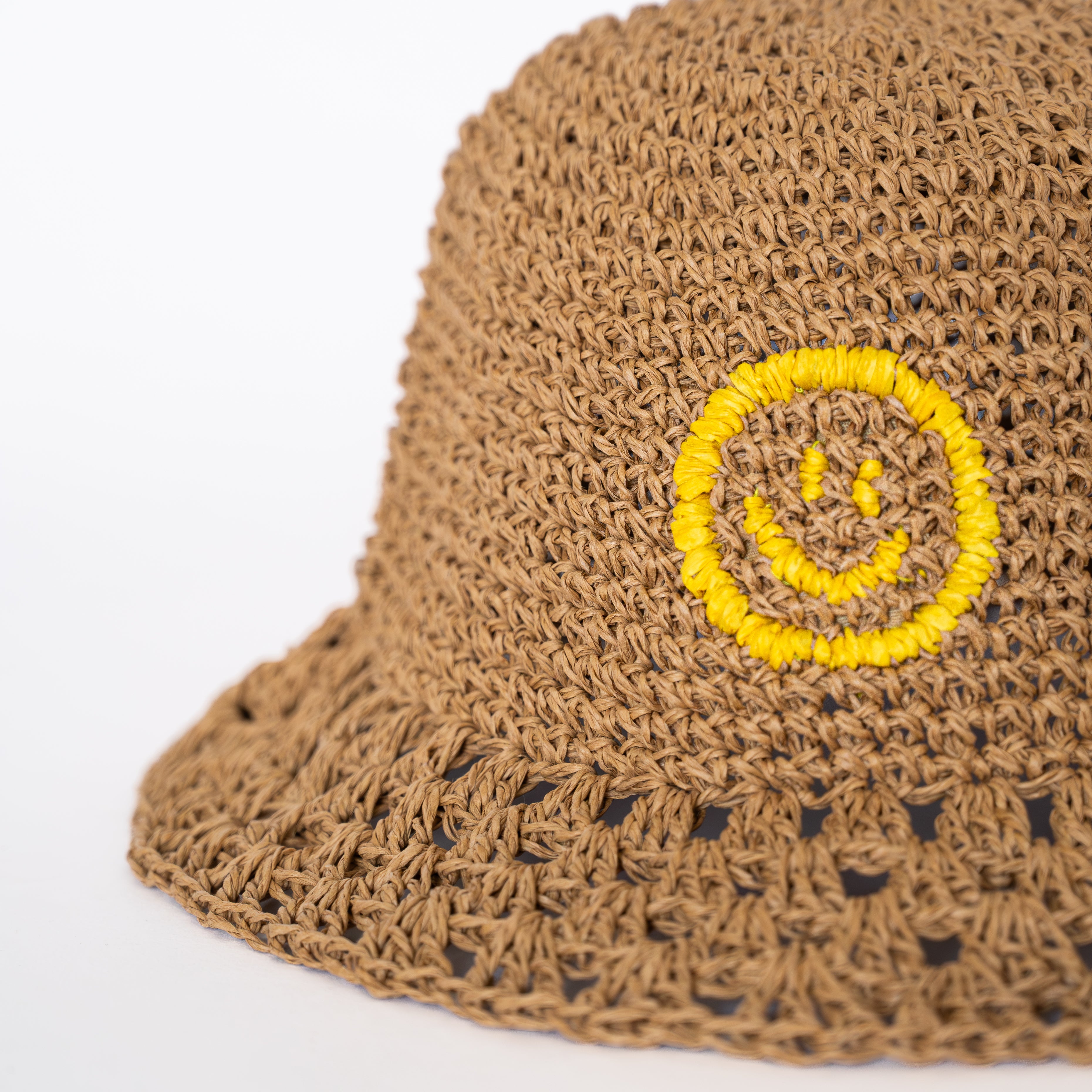 Raffia Bucket Hat in Sun yellow with signature OL smiley, front view